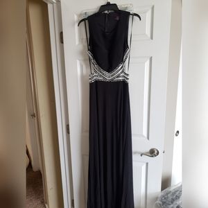 Formal dress with side cutouts and embellishments